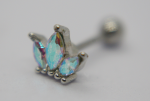 Close-up of a silver stud earring with three iridescent aqua marquise stones arranged like a small crown.