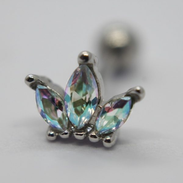 Small silver crown-shaped stud with three marquise iridescent gemstones reflecting blue-green-pink, on a blurred white background