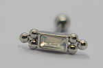 Silver barbell-style stud with a rectangular clear gemstone flanked by polished metal beads