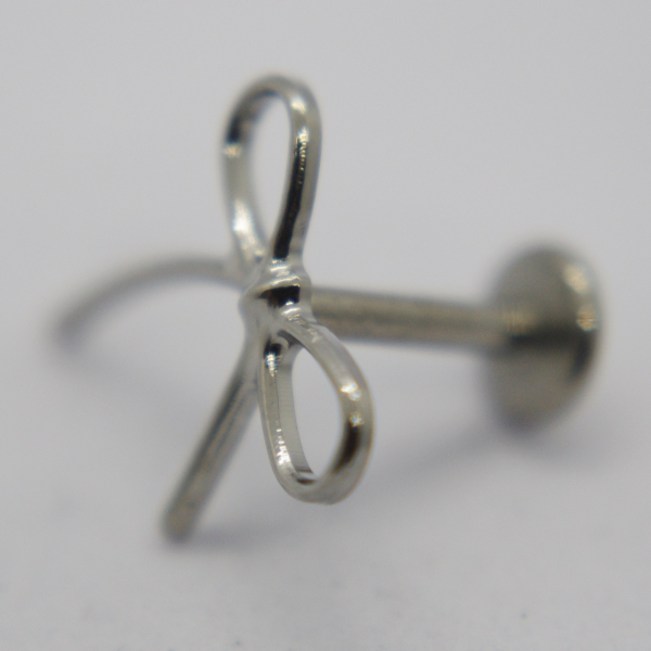 Small silver earring stud with looped bow-shaped front and straight post with flat disc back on white background.
