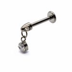 Silver barbell-style labret piercing stud with a small bezel-set dangling clear gemstone on a white background.