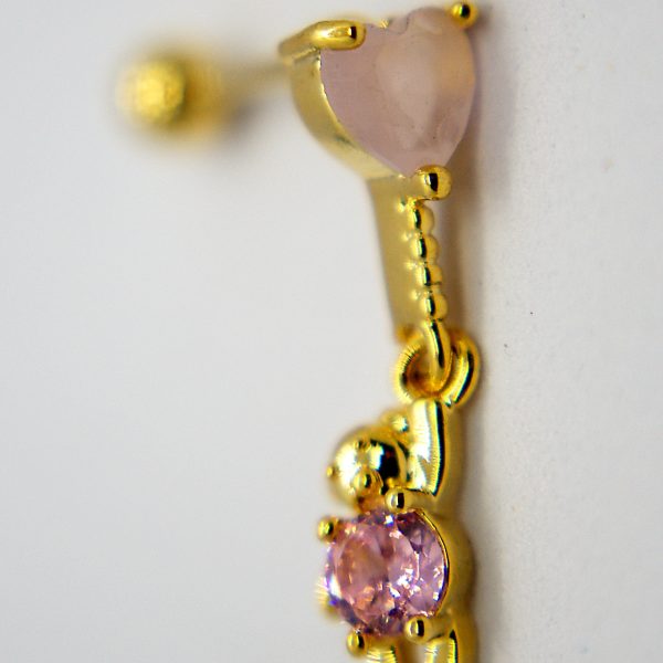 Gold earring with a small heart-shaped pale pink stone and a dangling round pink gemstone set in gold, on a white background.