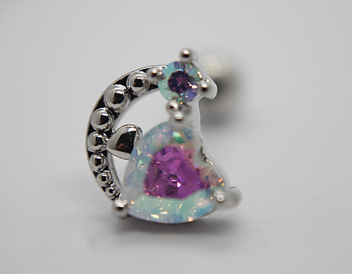Silver crescent moon stud with beaded detail holding a heart-shaped iridescent opal stone featuring a purple center and small round top gem.