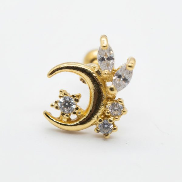 Gold crescent moon stud earring adorned with three round clear stones and two marquise-cut clear stones on white background.