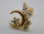 Gold crescent moon stud earring adorned with small clear round and marquise gemstones on a white background.