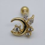 Gold crescent-moon stud with three round clear stones and two marquise clear stones on a white background.