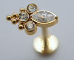 Gold stud earring with a marquise clear crystal and three round faceted crystals clustered with small gold beads.
