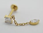 Gold stud earring with short chain linking square-cut and pear-shaped clear stones on a white background.