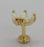 Gold labret stud with three iridescent marquise opal stones held in a crown-like prong setting.