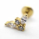 Gold stud earring with small round and marquise clear gemstones clustered, shown in a close-up on a white background.