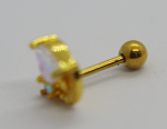 Small gold barbell earring with pronged opal-like gem and round ball back resting on a pale surface.