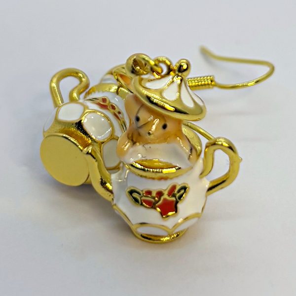 Pair of small white enamel teapot charms with gold trim, red floral decals, and gold earring hooks
