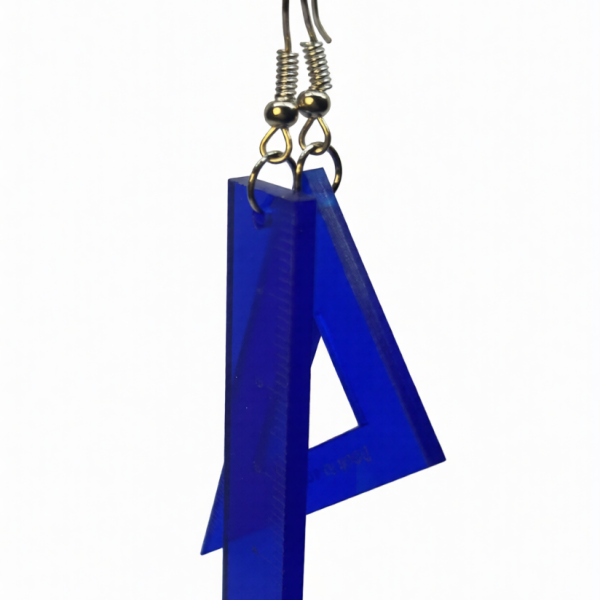Blue translucent acrylic triangular dangle earring with silver hook and gold rings on a white background